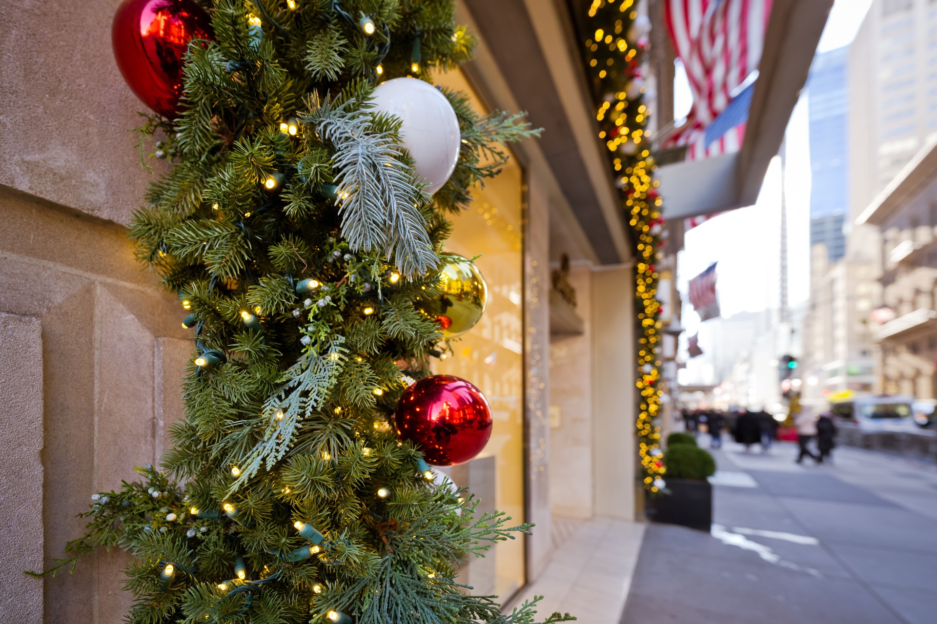 Festive Holiday Decorations on Storefront in New York City During Christmas Season